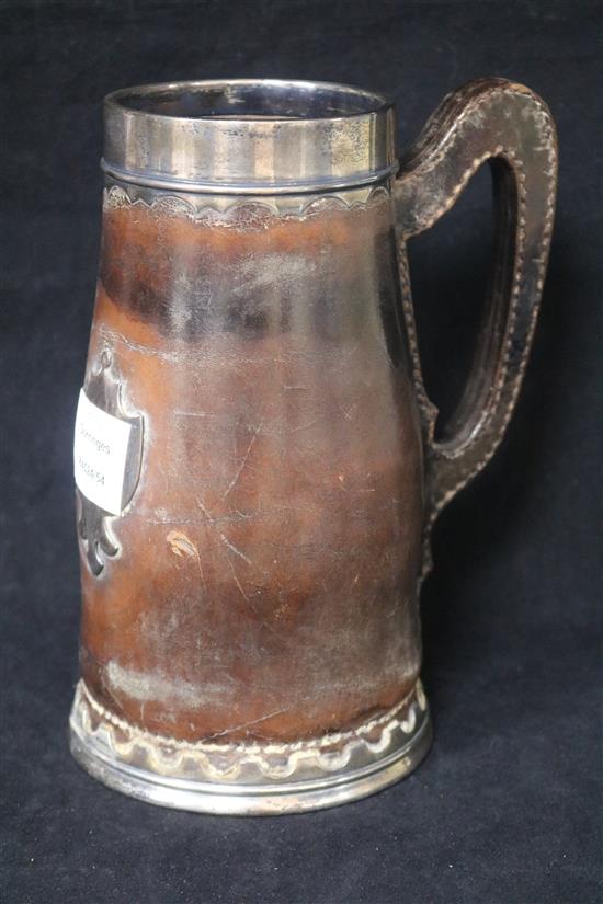 A silver mounted leather blackjack tankard, import marks for Gorham Manufacturing Co, Birmingham, 1918, 23.1cm.